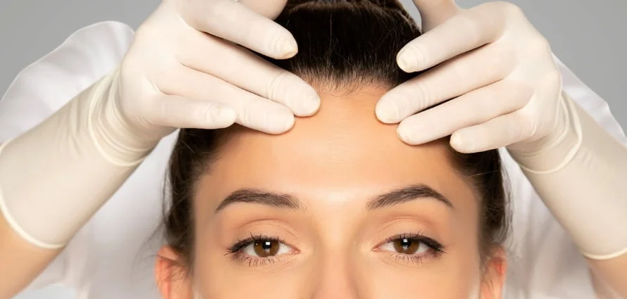 Woman strong facial expression and forehead wrinkles